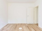 Wohnzimmer - 2-Zimmer EG Wohnung mit Einbauküche
